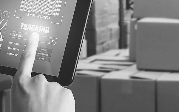 a man managing logistics tracking data a man managing logistics tracking data